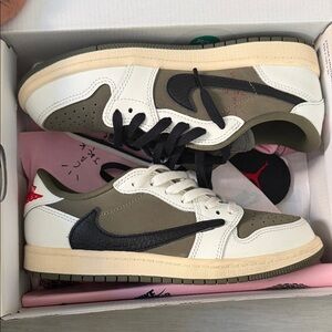 Travis Scott Jordan 1 Low Sneakers in White, Black, Olive and red .